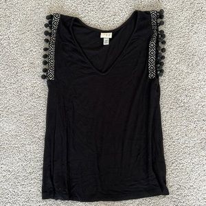 Black v-neck tank top with Pom Pom detail